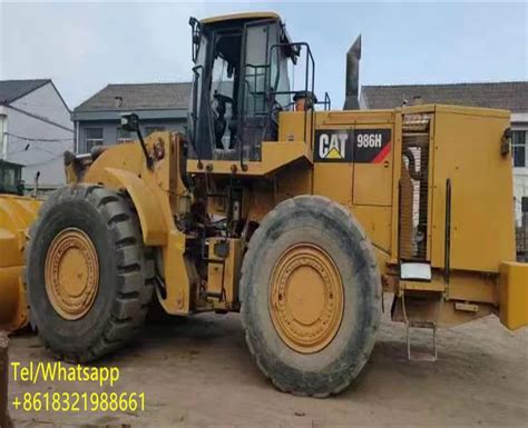 cat skid steer tires and wheels|cat wheel loader 986h tires.